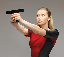 Image showing futuristic woman with gadget