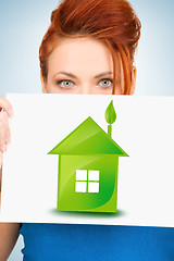 Image showing woman with illustration of green eco house