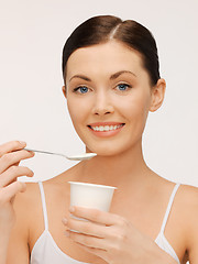 Image showing woman with yogurt