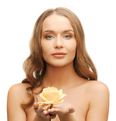 Image showing lovely woman with rose flower