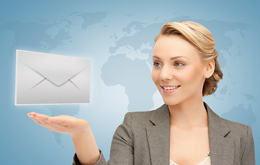 Image showing woman showing virtual envelope