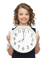 Image showing girl with big clock