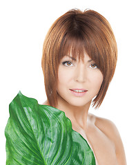 Image showing woman with green leaf