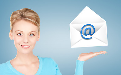 Image showing woman showing virtual envelope