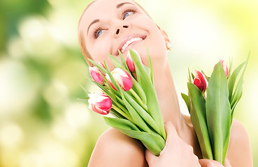 Image showing happy woman with flowers