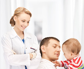 Image showing doctor with patients