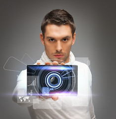 Image showing futuristic man with gadget