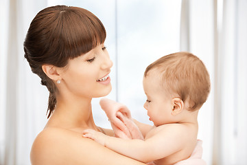 Image showing happy mother with adorable baby