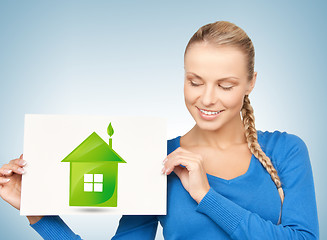 Image showing woman with illustration of green eco house