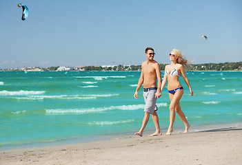 Image showing couple walking on the beach