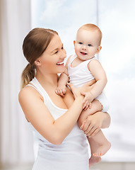 Image showing happy mother with adorable baby