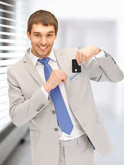 Image showing businessman with credit card