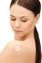 Image showing beautiful woman with medical patch or plaster