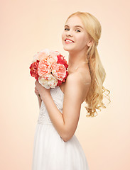 Image showing woman with bouquet of flowers