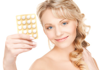 Image showing woman with pills