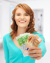 Image showing happy teenage girl with euro cash money