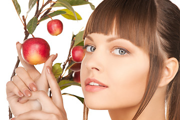 Image showing lovely woman with apple twig