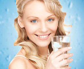 Image showing woman holding glass of water