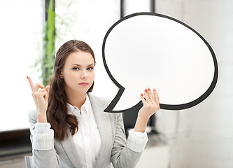 Image showing businesswoman holding blank text bubble