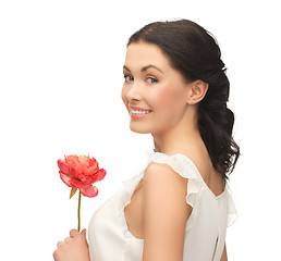 Image showing young and beautiful woman with flower