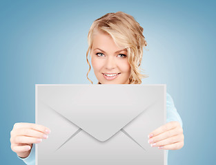 Image showing woman showing virtual envelope