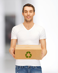 Image showing handsome man with recyclable box