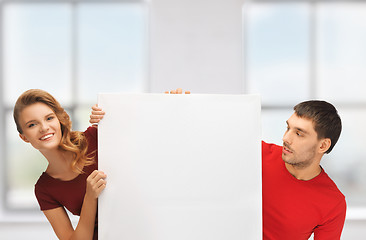 Image showing man and woman with big blank board