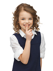 Image showing pre-teen girl showing hush gesture