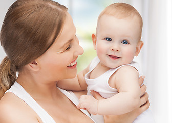 Image showing happy mother with adorable baby