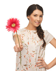 Image showing young and beautiful woman with flower