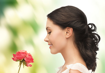 Image showing young and beautiful woman with flower