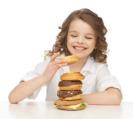 Image showing girl with junk food