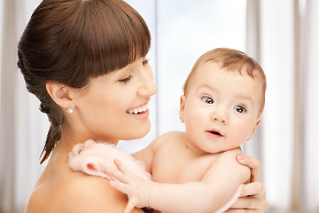 Image showing happy mother with adorable baby