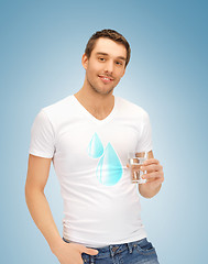 Image showing man holding glass of water