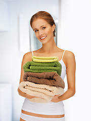 Image showing lovely woman with towels