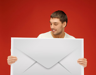 Image showing man showing virtual envelope