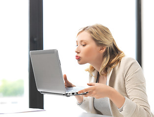 Image showing happy woman with laptop computer