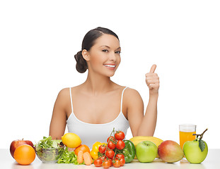 Image showing woman gives thumbs up with fruits and vegetables