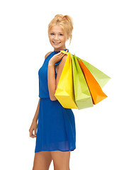 Image showing happy teenage girl with shopping bags