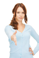 Image showing woman with an open hand ready for handshake