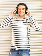 Image showing man in casual clothes with headphones