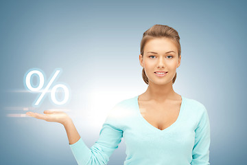 Image showing woman showing sign of percent in her hand