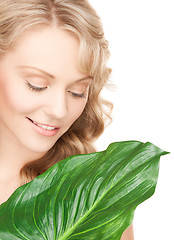 Image showing woman with green leaf