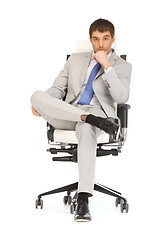 Image showing man sitting in chair