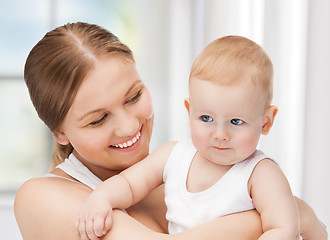 Image showing happy mother with adorable baby