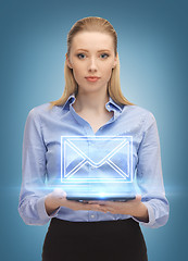 Image showing woman with tablet pc sending e-mail