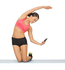 Image showing beautiful sporty woman doing exercise