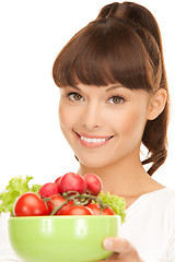 Image showing woman in the kitchen with tomatoes