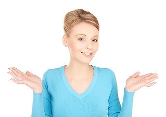 Image showing woman shrugging or doubting