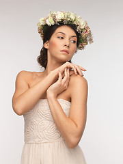 Image showing woman wearing wreath of flowers